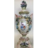 A Continental porcelain two-handled vase and cover