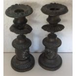 A pair of brass candlesticks with gadroon rims. Es