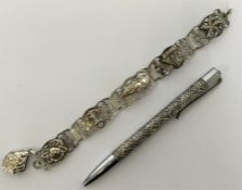 A Sterling silver pencil together with a gilt brac