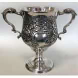 A George III heavy Irish silver embossed two-handl