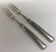 A pair of Antique Irish silver forks with tapered