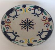 A large Japanese porcelain saucer dish brightly pa