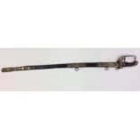An Antique brass-mounted sword in leather scabbard