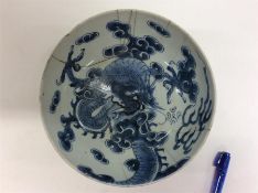A Chinese blue and white-ground shallow bowl decor