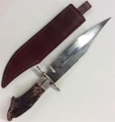 A good quality knife with tusk handle and steel bl