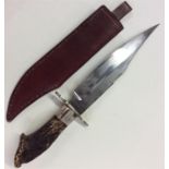 A good quality knife with tusk handle and steel bl