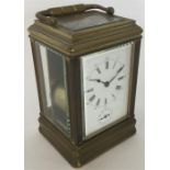 A good brass carriage clock with white enamelled d