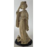 A good quality Antique ivory figure of a lady in f