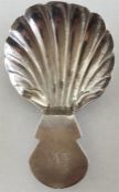 A Georgian silver caddy scoop with fluted bowl. Lo