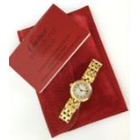 CARTIER: A lady's 18 carat gold wristwatch with si
