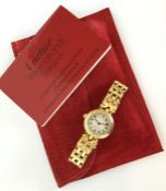CARTIER: A lady's 18 carat gold wristwatch with si