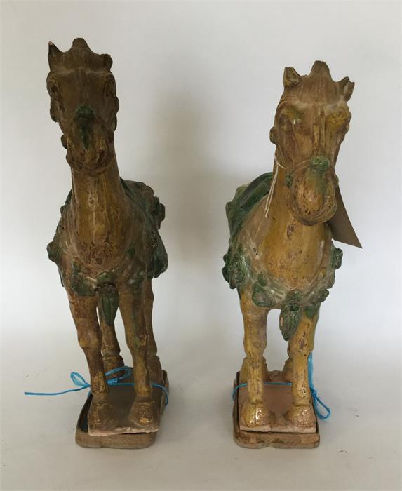 A pair of Antique carved terracotta figures of hor - Image 2 of 2