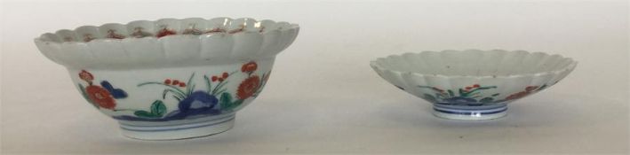 A pair of Japanese Kakiemon porcelain fluted circu