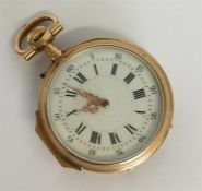 A Continental gold fob watch with white enamelled