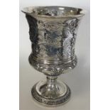 A good Georgian silver tapering beaker decorated w