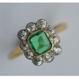 A good quality emerald and diamond square cluster