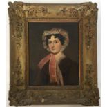 A gilt framed portrait of a lady wearing a bonnet.