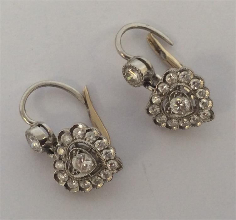 A pair of attractive diamond heart-shaped earrings