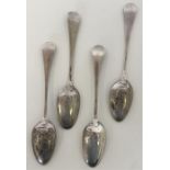 A heavy set of four silver bottom marked teaspoons