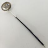 A Georgian silver toddy ladle with crimped rim and