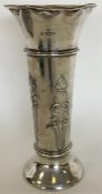 A large silver tapering spill vase with floral dec