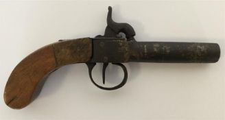 A mahogany pocket pistol. Est. £30 - £40.
