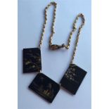A good quality gold mounted necklace decorated wit