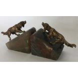 A pair of agate bookends mounted with hunting dogs