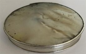 An Antique oval silver mounted and MOP pill box. A
