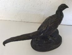 A good paperweight in the form of a cock pheasant