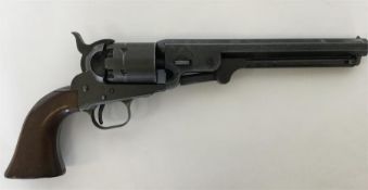 A replica Naval revolver with mahogany handle. Est