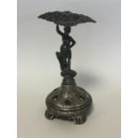 A Continental silver hat pin stand decorated with