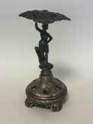 A Continental silver hat pin stand decorated with