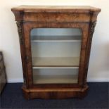 A Victorian walnut pier cabinet with wavy base, br