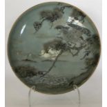 A Japanese circular shallow dish painted with a bi