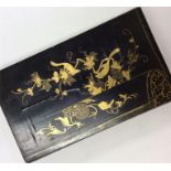 A lacquer boxed travelling set decorated with vine
