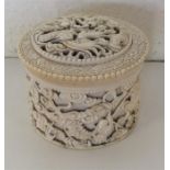 A good Antique carved ivory cylindrical box with l