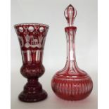 A ruby-glass overlay oviform decanter and teardrop