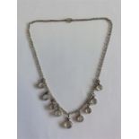 A nine stone moonstone necklet with silver ring cl
