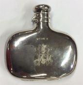A good quality kidney-shaped silver hip flask with