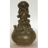 An early Japanese funeral vase in brown, decorated