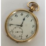 A gent's gilt open-faced pocket watch with white e