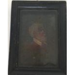 An Antique wax panel of a gentleman contained with