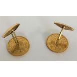 A pair of heavy Eastern high carat gold coin cuffl