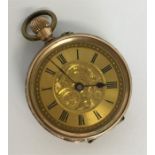 A small 9 carat fob watch with gilt dial. Approx.