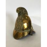 A heavy brass Merryweather Fireman's helmet. Est.