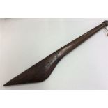 A carved tribal spear etched with stars. Approx. 5