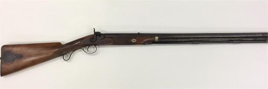 An English mahogany hunting rifle with secret comp