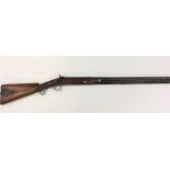 An English mahogany hunting rifle with secret comp