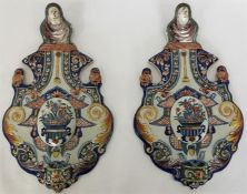 A pair of Dutch Delft polychrome shield-shaped wal